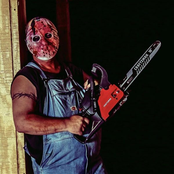 Photo of man in mask with chainsaw taken at Haunting at the Ridge. Haunting at the Ridge is Connecticut's scariest haunted attraction located at Powder Ridge Mountain in Middlefield, CT.