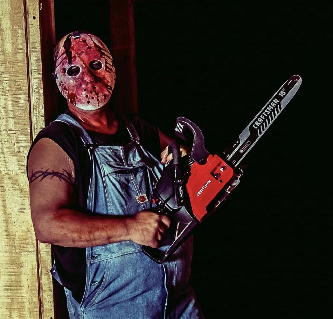 Photo of man in mask with chainsaw taken at Haunting at the Ridge. Haunting at the Ridge is Connecticut's scariest haunted attraction located at Powder Ridge Mountain in Middlefield, CT.